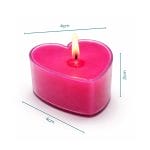 Candela a cuore rosa profumata dimensioni 4x4x2 cm su sfondo bianco