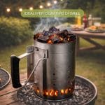 carbone coreografica con ciminiera Carbone vegetale acceso in ciminiera per barbecue