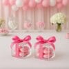 Scatoline plexiglass con fiocco rosa e confetti, perfette per battesimi e nascite
