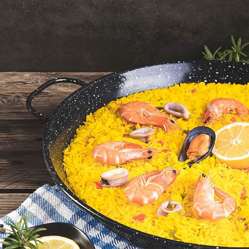 padella paella in ferro smaltato nero con manici resistenti e riso con gamberi e cozze