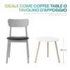 Tavolino rotondo h 39 cm accanto a sedia standard, ideale come coffee table
