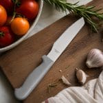 Coltello da pizza con lama seghettata temprata e manico ergonomico in polipropilene