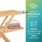 Dettaglio asse da stiro in legno con poggiaferro in metallo e ripiano portabiancheria, struttura resistente e stabile