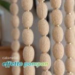 Dettaglio catenelle beige effetto pompon intrecciato