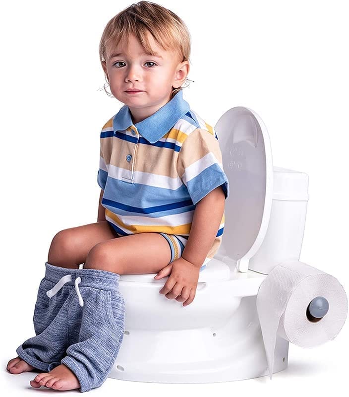 vasino-educativo-batteria Bambino seduto su vasino educativo Dolu bianco, ideale per imparare a usare il WC